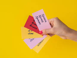 A student using flashcards to enhance memory retention.